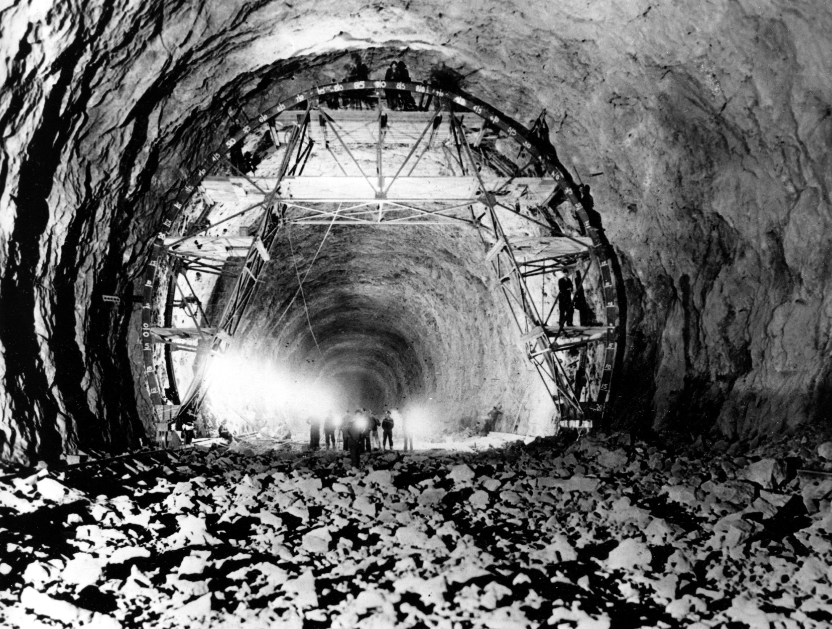 On this date in 1936, Boulder Dam (now Hoover Dam) began operation as President Franklin D. Roosevelt pressed a key in Washington to signal the startup of the dam's first hydroelectric generator. This view shows the interior of one of the tunnels through which the Colorado River would be diverted around the Hoover Dam site in Boulder City, Nev., April 18, 1932.  (AP Photo)