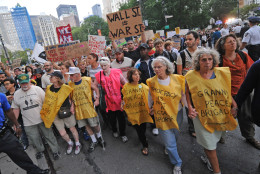 On this date in 2011, a demonstration calling itself Occupy Wall Street began in New York, prompting similar protests around the U.S. and the world. (AP Photo/ Louis Lanzano)
