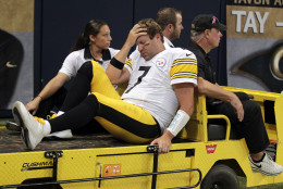 Pittsburgh Steelers quarterback Ben Roethlisberger is carted off the field after being injured during the third quarter of an NFL football game against the St. Louis Rams Sunday, Sept. 27, 2015, in St. Louis. (AP Photo/Tom Gannam)