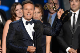 Mark Burnett accepts the award for outstanding reality - competition program for The Voice at the 67th Primetime Emmy Awards on Sunday, Sept. 20, 2015, at the Microsoft Theater in Los Angeles. (Photo by Phil McCarten/Invision for the Television Academy/AP Images)