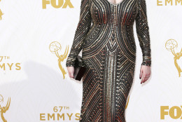 IMAGE DISTRIBUTED FOR THE TELEVISION ACADEMY - Christina Hendricks arrives at the 67th Primetime Emmy Awards on Sunday, Sept. 20, 2015, at the Microsoft Theater in Los Angeles. (Photo by Danny Moloshok/Invision for the Television Academy/AP Images)