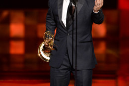 Peter Dinklage accepts the award for outstanding supporting actor in a drama series for Game of Thrones at the 67th Primetime Emmy Awards on Sunday, Sept. 20, 2015, at the Microsoft Theater in Los Angeles. (Photo by Phil McCarten/Invision for the Television Academy/AP Images)