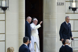 Pope Francis waves as he departs the Apostolic Nunciature, the Vatican's diplomatic mission in Washington, Wednesday, Sept. 23, 2015, for the White House where President Barack Obama will host a state arrival ceremony.  (AP Photo/Cliff Owen)