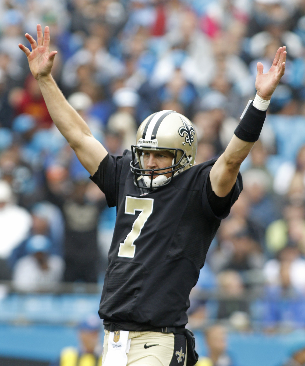 New Orleans Saints' Luke McCown (7) celebrates a touchdown against the Carolina Panthers in the first half of an NFL football game in Charlotte, N.C., Sunday, Sept. 27, 2015. (AP Photo/Bob Leverone)