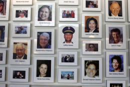 This is a wall of photos of the 40 crew and passengers who perished in the crash of the United Airlines Flight 93 on display at the new Flight 93 National Memorial Visitors Center in Shanksville, Pa, on Wednesday, Sept. 9, 2015. The visitors center will be formally dedicated and open to the public on Sept. 10, 2015. (AP Photo/Gene J. Puskar)