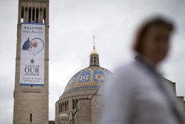 A banner is displayed ahead of Pope Francis' visit at the Basilica of the National Shrine of the Immaculate Conception Monday, Sept. 21, 2015, in Washington. Pope Francis will celebrate Mass Wednesday at the basilica, the largest Catholic church in the United States and North America, with a crowd of about 30,000. (AP Photo/David Goldman)