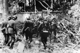 One of the first military operations between Germany and Poland was the bombardment and consequent occupation of the Polish ammunition dump Westerplatte in the Danzig territory on Sept. 1, 1939.  Here, Nazi soldiers occupy Westerplatte. (AP Photo)