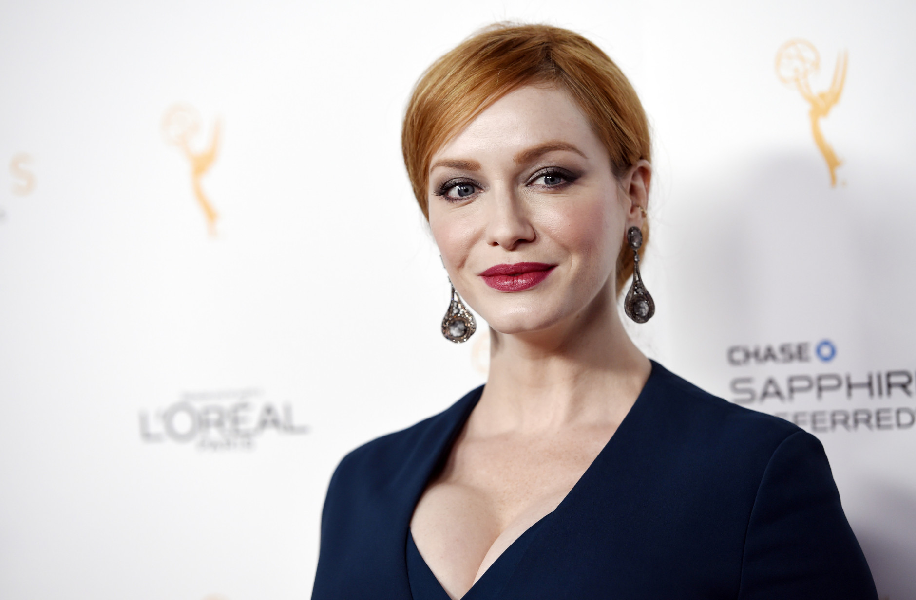 Christina Hendricks, an Emmy nominee for Outstanding Supporting Actress in a Drama Series for "Mad Men," poses at the 67th Emmy Awards Performers Nominee Reception at the Pacific Design Center on Saturday, Sept. 19, 2015, in West Hollywood, Calif. (Photo by Chris Pizzello/Invision/AP)