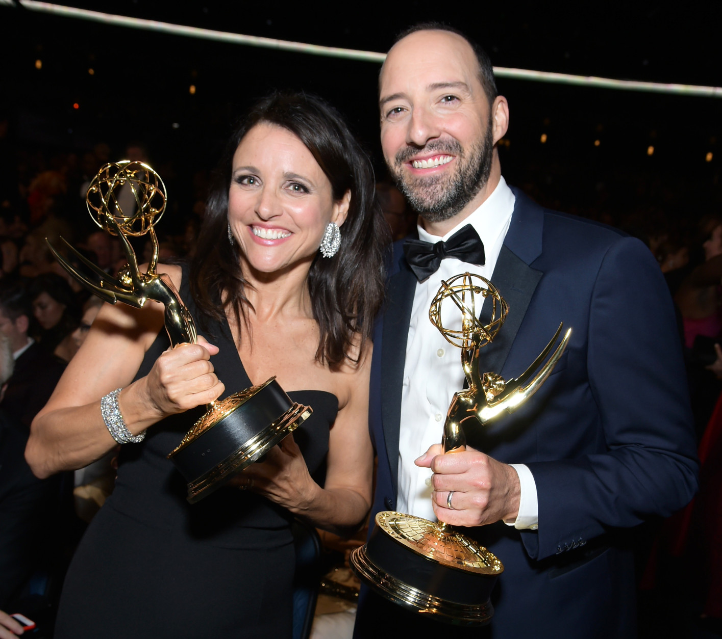 Julia Louis-Dreyfus, winner of the award for outstanding lead actress in a comedy series for "Veep", left, and Tony Hale, winner of award for outstanding supporting actor in a comedy series for Veep, pose at the 67th Primetime Emmy Awards on Sunday, Sept. 20, 2015, at the Microsoft Theater in Los Angeles. (Photo by Charles Sykes/Invision for the Television Academy/AP Images)