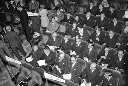 On this date in 1951, President Harry S. Truman addressed the nation from the Japanese peace treaty conference in San Francisco in the first live, coast-to-coast television broadcast. Here, the Japanese delegation to the peace treaty conference await Truman's speech. (AP Photo)