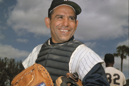 File-New York Yankee catcher Yogi Berra poses at spring training in Florida, in an undated file photo. Berra, the Yankees Hall of Fame catcher has died. He was 90. (AP Photo/File)