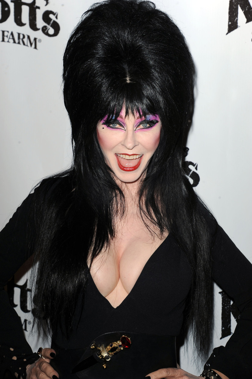 Actress Elvira is 64 on Sept. 17. Here, Elvira attends the VIP Opening of Knotts Scary Farm HAUNT on Thursday, Oct. 3, 2013 in Buena Park, Calif. (Photo by Katy Winn/Invision/AP)