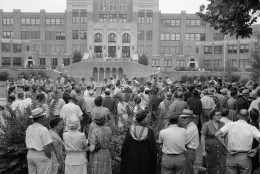 On this date in 1957, Arkansas Gov. Orval Faubus used Arkansas National Guardsmen to prevent nine black students from entering all-white Central High School in Little Rock. Here, only White students entered Central High School at Little Rock, Ark., on Sept. 5, 1957.   (AP Photo/William P Straeter)