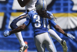 San Diego Chargers wide receiver Keenan Allen (13) hauls in a pass as Detroit Lions cornerback Rashean Mathis defends during the second half of an NFL football game Sunday, Sept. 13, 2015, in San Diego. (AP Photo/Denis Poroy)