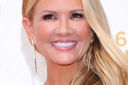 Nancy O'Dell arrives at the 67th Primetime Emmy Awards on Sunday, Sept. 20, 2015, at the Microsoft Theater in Los Angeles. (Photo by Vince Bucci/Invision for the Television Academy/AP Images)