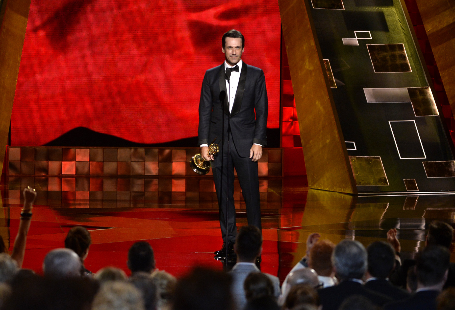 Jon Hamm accepts the award for outstanding lead actor in a drama series for Mad Men at the 67th Primetime Emmy Awards on Sunday, Sept. 20, 2015, at the Microsoft Theater in Los Angeles. (Photo by Phil McCarten/Invision for the Television Academy/AP Images)