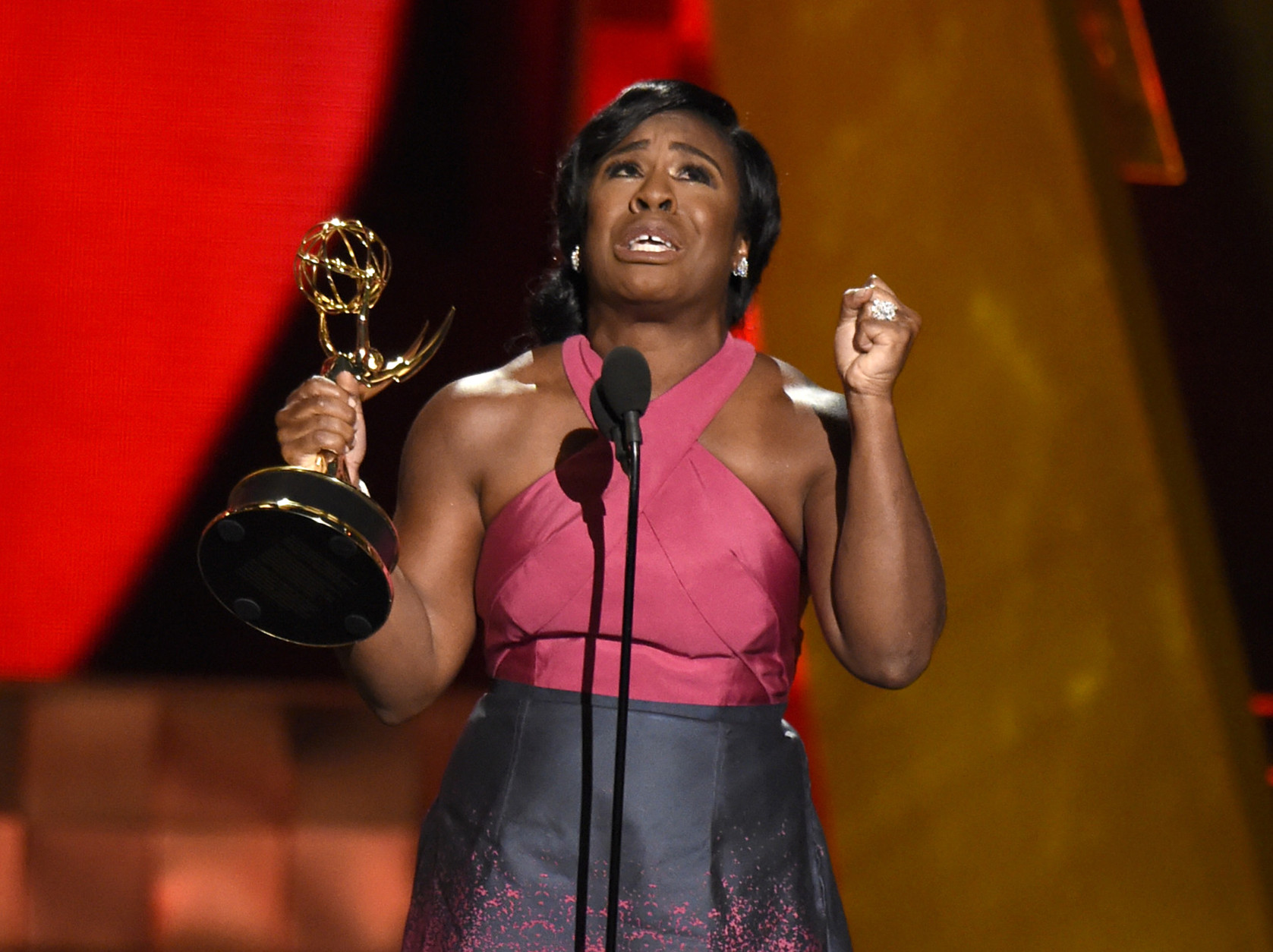 Uzo Aduba accepts the award for outstanding supporting actress in a drama series for Orange Is The New Black at the 67th Primetime Emmy Awards on Sunday, Sept. 20, 2015, at the Microsoft Theater in Los Angeles. (Photo by Chris Pizzello/Invision/AP)