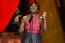 Uzo Aduba accepts the award for outstanding supporting actress in a drama series for Orange Is The New Black at the 67th Primetime Emmy Awards on Sunday, Sept. 20, 2015, at the Microsoft Theater in Los Angeles. (Photo by Chris Pizzello/Invision/AP)