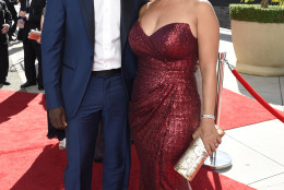 IMAGE DISTRIBUTED FOR THE TELEVISION ACADEMY - Don Cheadle, left, and Bridgid Coulter arrive at the 67th Primetime Emmy Awards on Sunday, Sept. 20, 2015, at the Microsoft Theater in Los Angeles. (Photo by Dan Steinberg/Invision for the Television Academy/AP Images)
