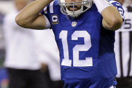Indianapolis Colts quarterback Andrew Luck (12) reacts to fumbling the ball against the New York Jets in the first half of an NFL football game in Indianapolis, Monday, Sept. 21, 2015.  (AP Photo/AJ Mast)