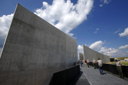 Members of the media get a preview of the the Flight 93 National Memorial visitors center complex in Shanksville, Pa, on Wednesday, Sept. 9, 2015. The visitors center will be formally dedicated and open to the public on Sept. 10, 2015. (AP Photo/Gene J. Puskar)