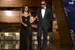 Taraji P. Henson, left, and Terrence Howard presents the award for outstanding writing for a limited series, movie or a dramatic special at the 67th Primetime Emmy Awards on Sunday, Sept. 20, 2015, at the Microsoft Theater in Los Angeles. (Photo by Phil McCarten/Invision for the Television Academy/AP Images)