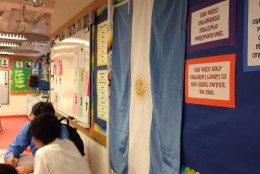 An Argentine flag hangs in the Art and Spanish room at the school. (WTOP/Jamie Forzato)