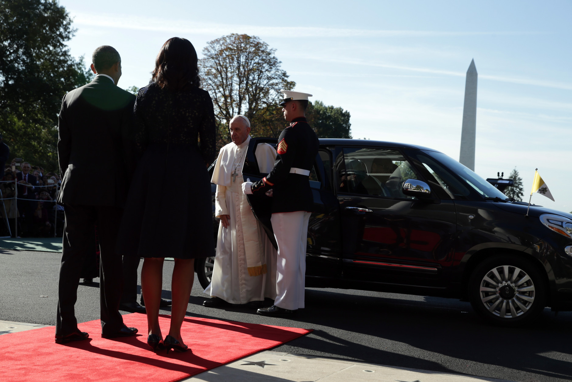 WASHINGTON, DC - SEPTEMBER 23:   Pope Francis exits his car to greet the U.S. President Barack Obama and first Lady Michelle Obama in an arrival ceremony at the White House on September 23, 2015 in Washington, DC. The Pope begins his first trip to the United States at the White House followed by a visit to St. Matthew's Cathedral, and will then hold a Mass on the grounds of the Basilica of the National Shrine of the Immaculate Conception.  (Photo by Alex Wong/Getty Images)