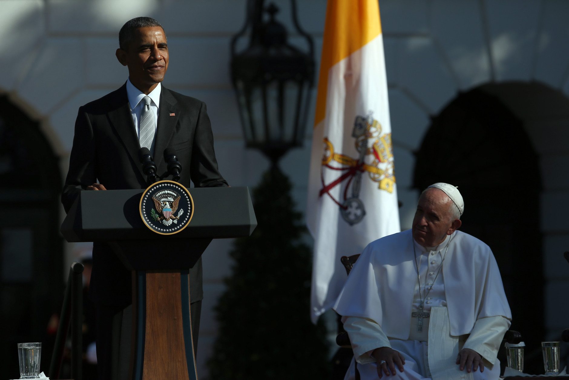 WASHINGTON, DC - SEPTEMBER 23:  U.S. President Barack Obama (L) speaks during the arrival ceremony for Pope Francis (R) at the White House on September 23, 2015 in Washington, DC. The Pope begins his first trip to the United States at the White House followed by a visit to St. Matthew's Cathedral, and will then hold a Mass on the grounds of the Basilica of the National Shrine of the Immaculate Conception.  (Photo by Win McNamee/Getty Images)
