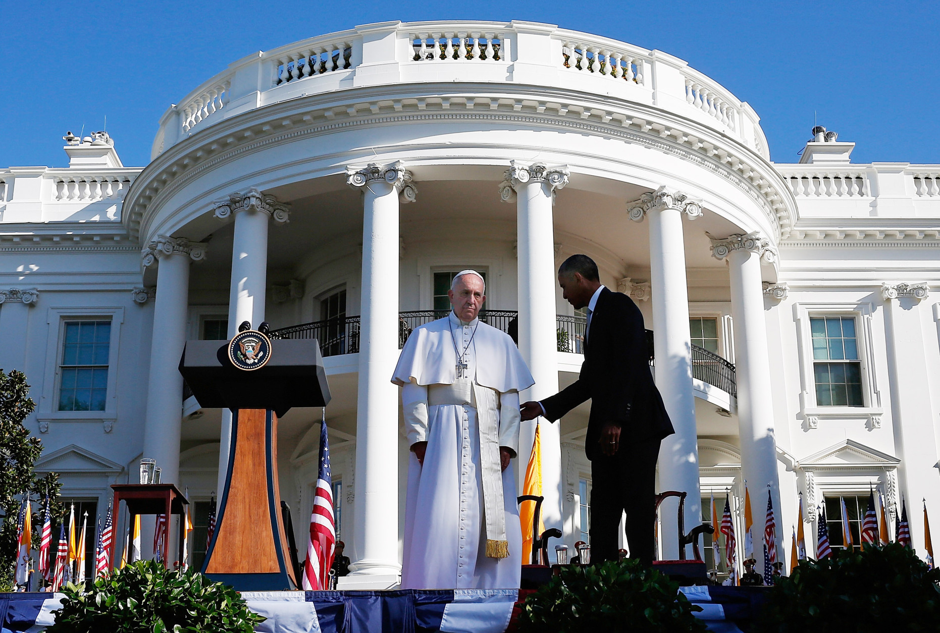 WASHINGTON, DC - SEPTEMBER 23:  U.S. President Barack Obama (R) welcomes Pope Francis (L) during an arrival ceremony at the White House on September 23, 2015 in Washington, DC. The Pope begins his first trip to the United States at the White House followed by a visit to St. Matthew's Cathedral, and will then hold a Mass on the grounds of the Basilica of the National Shrine of the Immaculate Conception.  (Photo by Win McNamee/Getty Images)