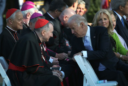 WASHINGTON, DC - SEPTEMBER 23:  U.S. Vice President Joe Biden speaks with members of the clergy before the start of an arrival ceremony for Pope Francis at the White House on September 23, 2015 in Washington, DC. The Pope begins his first trip to the United States at the White House followed by a visit to St. Matthew's Cathedral, and will then hold a Mass on the grounds of the Basilica of the National Shrine of the Immaculate Conception.  (Photo by Win McNamee/Getty Images)