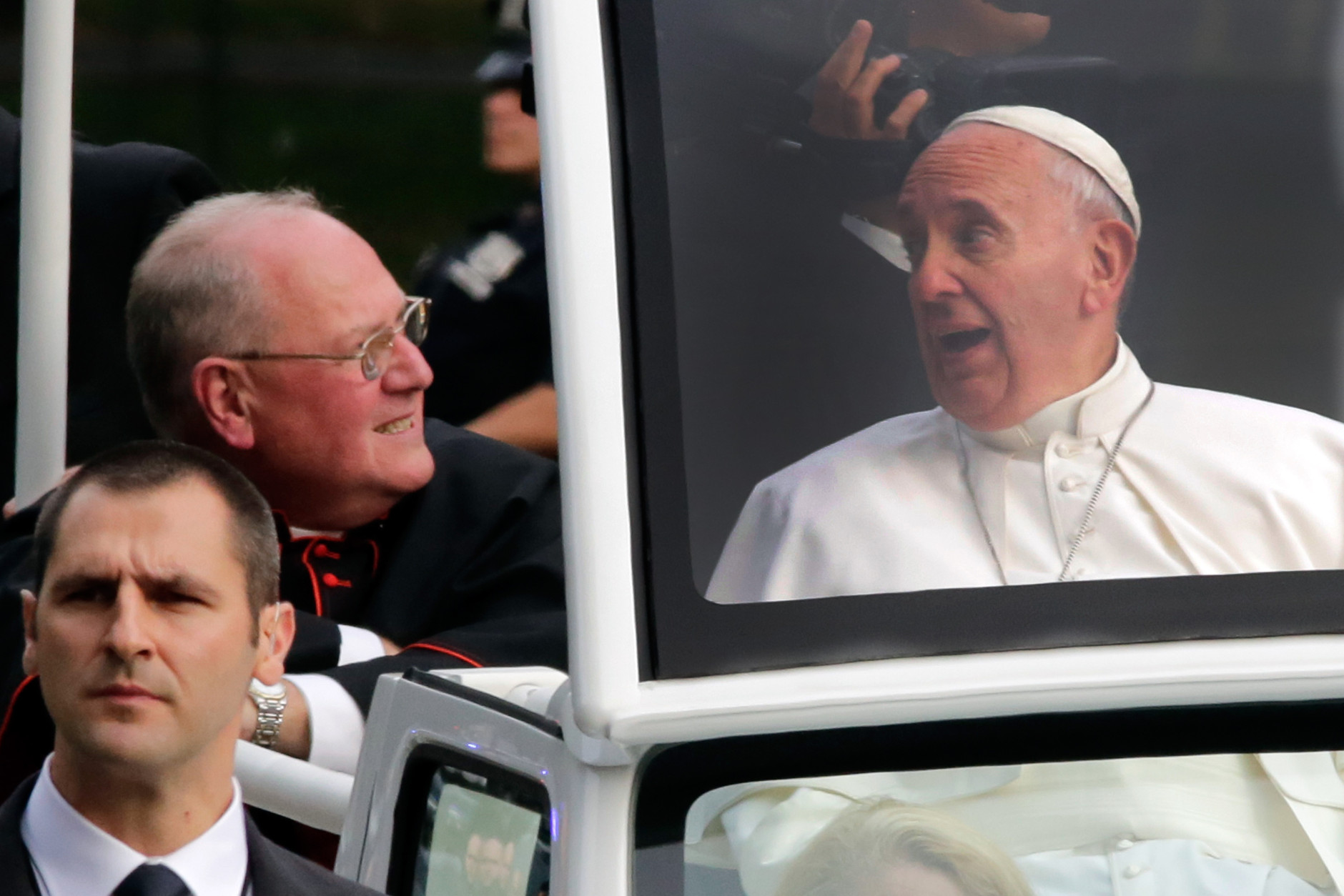 NEW YORK, NJ - SEPTEMBER 25:  Pope Francis and Cardinal Timothy Dolan (L) ride in the popemobile through Central Park September  25, 2015 in New York City. The pope is in New York on a two-day visit carrying out a number of engagements, including celebrating Mass in Madison Square Garden.   (Photo by Richard Drew-Pool/Getty Images)