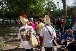 PHILADELPHIA, PA - SEPTEMBER 26: People wait for Pope Francis to arrive at the World Festival of Families at Benjamin Franklin Parkway on September 26, 2015 in Philadelphia, Pennsylvania. The Pope is concluding his U.S. tour by spending two days in Philadelphia; he previously visited Washington D.C. and New York City. (Photo by Andrew Burton/Getty Images)