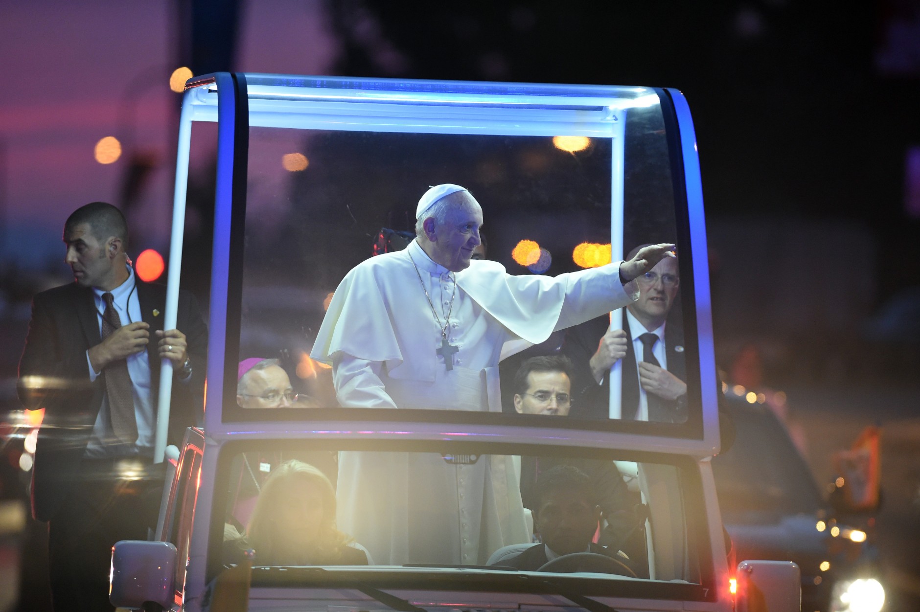 PHILADELPHIA, PA - SEPTEMBER 26: Pope Francis greets the crowd en route to the Festival of Families on September 26, 2015 in Philadelphia, Pennsylvania. Pope Francis wraps up his trip to the United States with two days in Philadelphia, attending the Festival of Families and meeting with prisoners at the Curran-Fromhold Correctional Facility. (Photo by Jewel Samad-Pool/Getty Images)