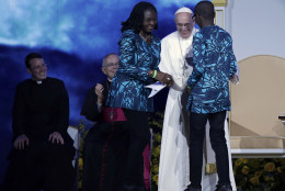 PHILADELPHIA, PA - SEPTEMBER 26:  Pope Francis greets a family from Nigeria during the Festival of Families on September 26, 2015 in Philadelphia, Pennsylvania. Pope Francis wraps up his trip to the United States with two days in Philadelphia, attending the Festival of Families and meeting with prisoners at the Curran-Fromhold Correctional Facility. (Photo by Matt Rourke-Pool/Getty Images)