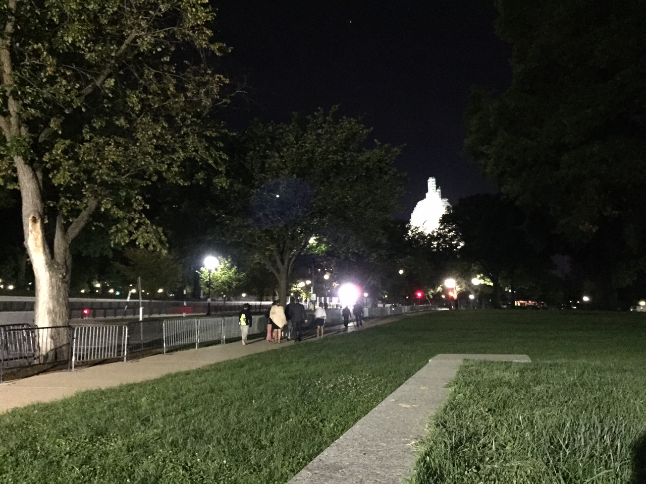 Visitors walk to the U.S. Capitol building, where Pope Francis will address Congress on Thursday, Sept. 24, 2015. (WTOP/Dennis Foley)