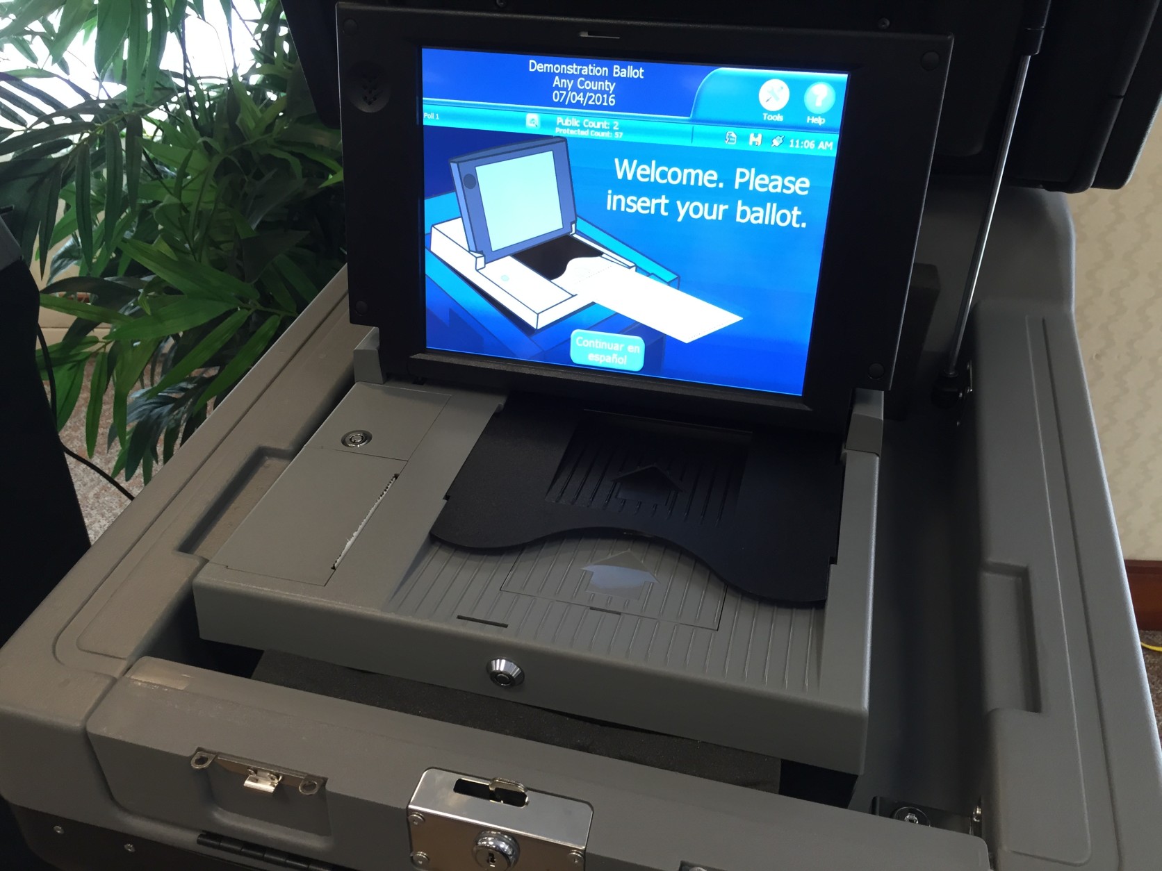 Touch screens will generate new paper ballots, which will then be electronically recorded. (WTOP/Andrew Mollenebeck)