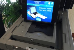 Touch screens will generate new paper ballots, which will then be electronically recorded. (WTOP/Andrew Mollenebeck)