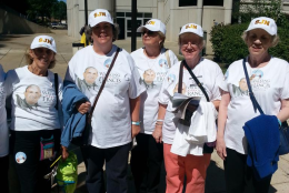 These members of St. John Neumann in Gaithersburg, Md. have some thoughts on Pope Francis' address to Congress on Thursday, Sept. 24, 2015. (WTOP/Rahul Bali) 