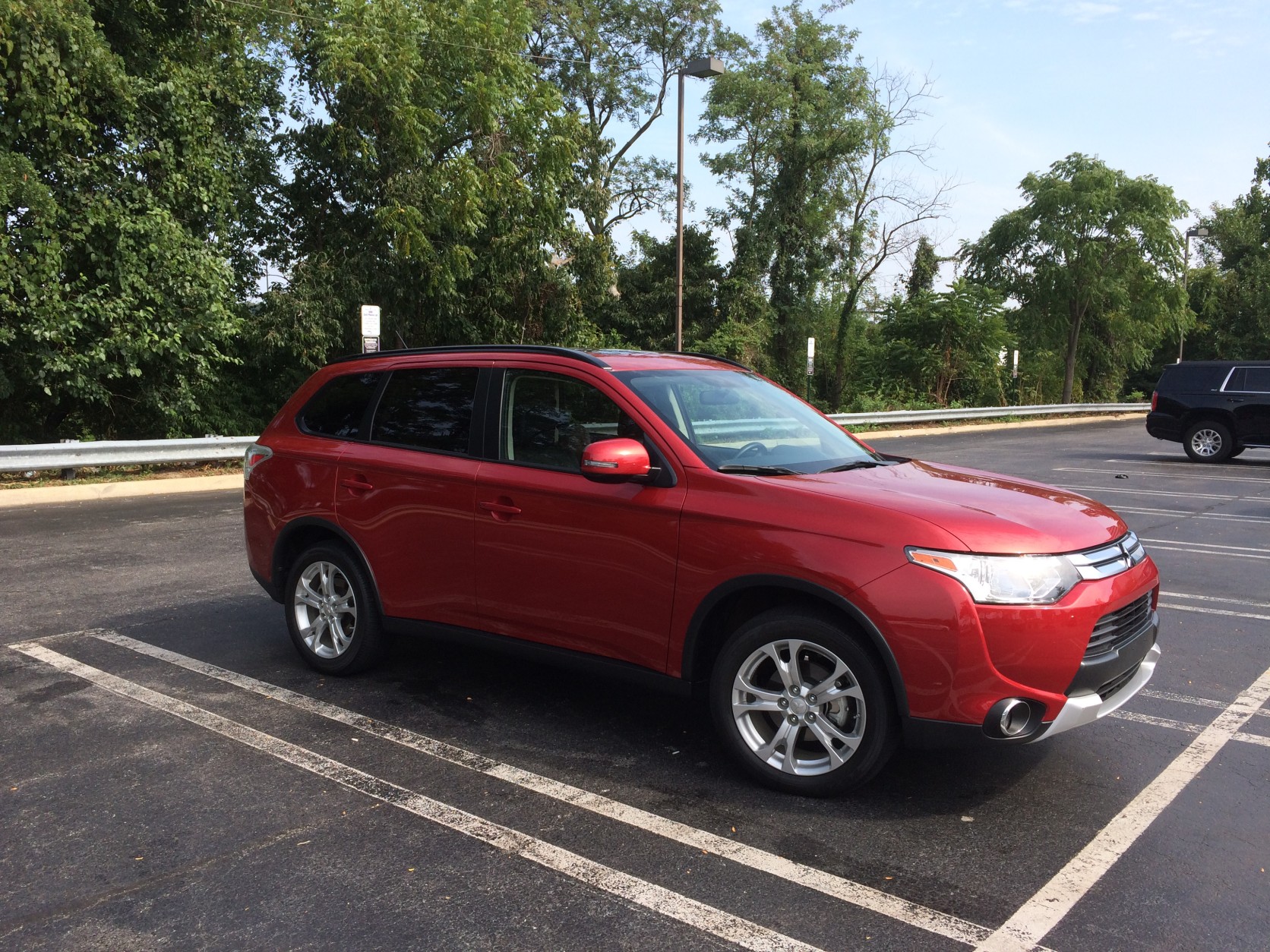  The 2015 Outlander is relatively inexpensive with just enough space for seven people, although children would be better served sitting in the third row of this quaint crossover. Look out for a redesign next year. (WTOP/Mike Parris)