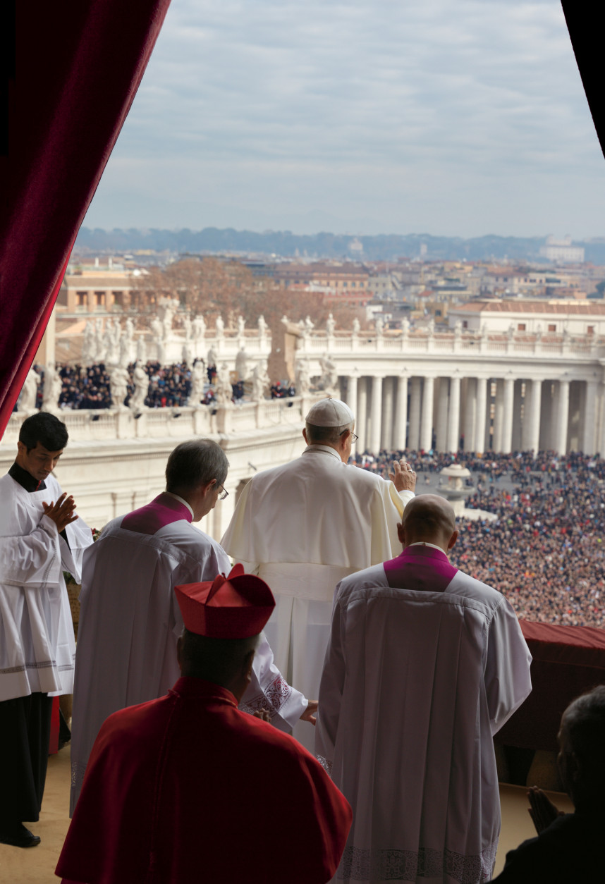 On Christmas Day, one of the holiest days in the Christian calendar, Pope Francis delivers his 2014 “Urbi et Orbi” (“To the City and to the World”) address and blessing. (Dave Yoder, National Geographic)