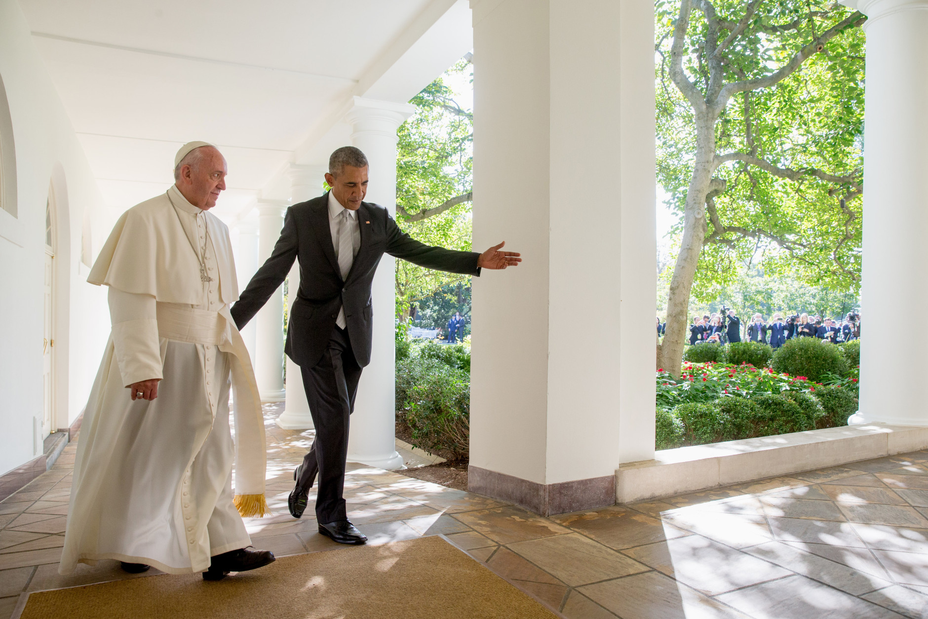 President Barack Obama and Pope Francis walk down the Colonnade before meeting in the Oval Office of the White House in Washington, Wednesday, Sept. 23, 2015. (AP Photo/Andrew Harnik)