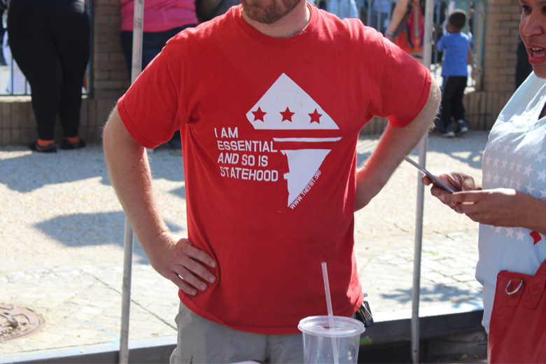 There were plenty of ways for locals to show their support for the D.C. Statehood movement for sale in stalls along the street. (WTOP/Dana Gooley)