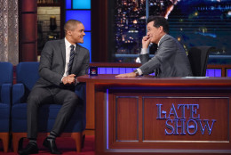 In this image released by CBS, Trevor Noah, left, of the "The Daily Show with Trevor Noah," left, appears with host Stephen Colbert during a taping of "The Late Show with Stephen Colbert," Thursday Sept. 17, 2015, in New York. (Jeffrey R. Staab/CBS via AP) MANDATORY CREDIT; NO ARCHIVE; NO SALES; FOR NORTH AMERICAN USE ONLY.