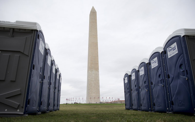 Portable toilets sit locked on the National Mall near the Washington Monument in Washington, Monday, Sept. 21, 2015, the day before Pope Francis arrives. Washington is bracing for the crowds hoping to get a glimpse of the Pontiff. (AP Photo/Carolyn Kaster)