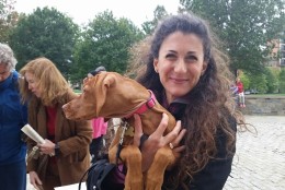 Audrey Wood os happy to have her Vizla puppy blessed Sunday, Oct. 14, 2015 at National Cathedral in Washington, D.C. (WTOP/Kathy Stewart)