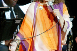 Dame Cleo Laine performs at the Jazz at Lincoln Center concert, "Here's to the Ladies: a Celebration of Great Women in Jazz," in New York, Monday, Nov. 17, 2003.  The benefit concert featured vocalists Diana Ross, Roberta Flack, Dame Cleo Laine and Dee Dee Bridgewater and jazz pianist Marian McPartland to help celebrate the contributions of Billie Holiday, Sarah Vaughan, Ella Fitzgerald and other legendary women of jazz. (AP Photo/Diane Bondareff)