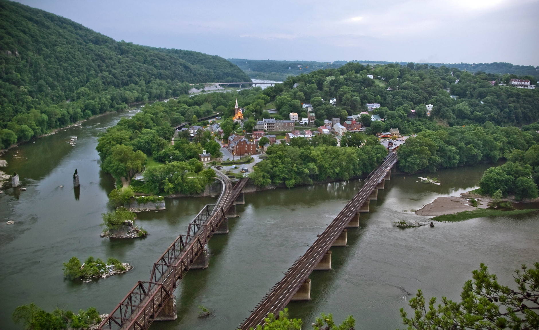 ** ADVANCE FOR WEEKEND EDITIONS, JUNE 13-14 ** FILE - This July 20, 2008 file photo offers a view looking down on Harpers Ferry, W.Va., at the conjunction of the Shanandoah, left, and the Potomac Rivers. The town was the site of abolitionist John Brown's infamous 1859 raid on the local arsenal, an event which led toward the Civil War. (AP/ Martin B. Cherry)