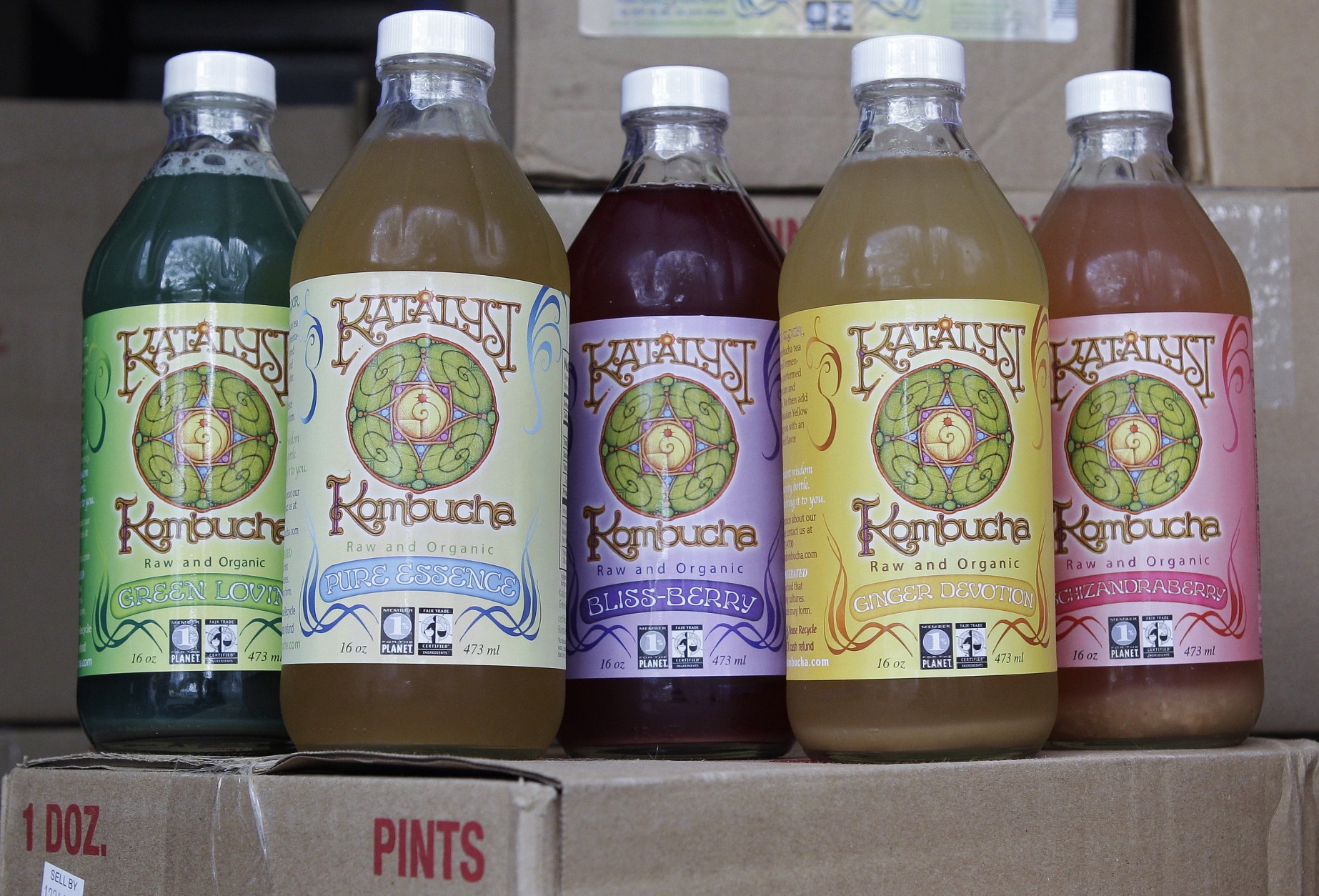 In this photo made July 1, 2010, the product line of Katalyst Kombucha fermented tea are displayed in a refrigerated storage unit at the Katalyst Kombucha company in Greenfield, Mass. Regulators and retailers are concerned that the ancient and trendy tea may need to be regulated as an alcoholic drink. That's because some bottles have more than 0.5 percent alcohol, the legal limit for a drink not to be considered alcoholic. (AP Photo/Charles Krupa)