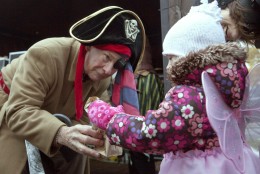 The Governor General of Canada David Johnston dressed as a pirate hands out candy to fairy Ella Statler at Rideau Hall on Halloween in Ottawa on Sunday, October 31, 2010. The Governor General's residence was open to the public for trick or treaters on Halloween  THE CANADIAN PRESS/Pawel Dwulit